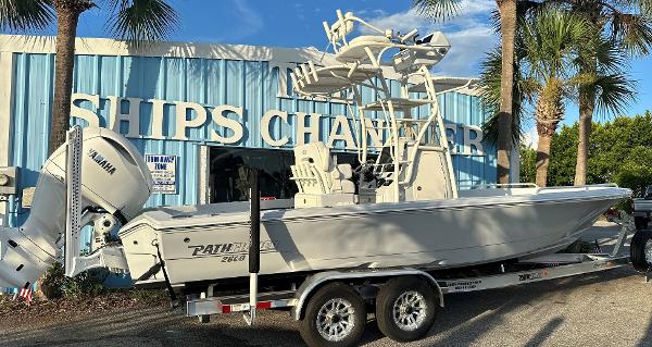 Pathfinder 2600 TRS 2025 Pathfinder 2600 TRS boat on trailer outside Ships Chandler building.