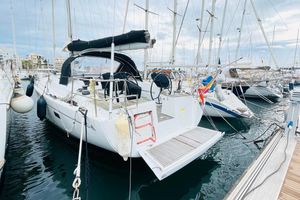 Hanse 455 2017 Hanse 455 yacht docked in a marina, surrounded by other sailboats.