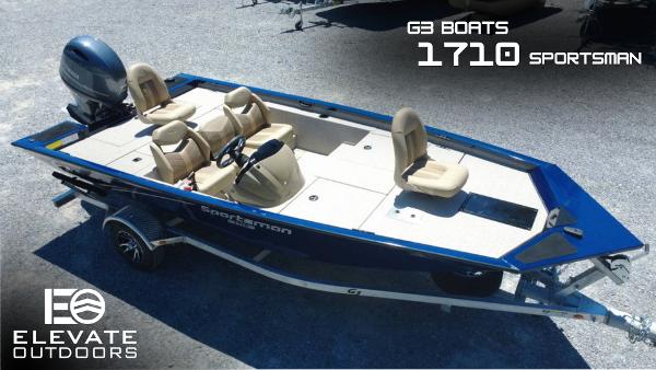 G3 Sportsman 1710 2025 G3 Sportsman 1710 boat on trailer, featuring beige seats and blue exterior.