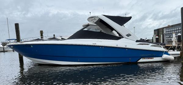 Monterey 298 Ss 2018 Monterey 298 Super Sport boat docked in marina, blue and white design.