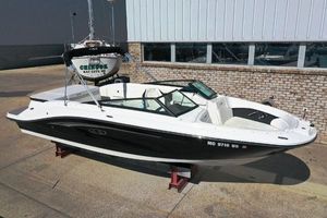 Sea Ray SPX 230 2022 Sea Ray 230 SPX boat displayed outdoors on stands.