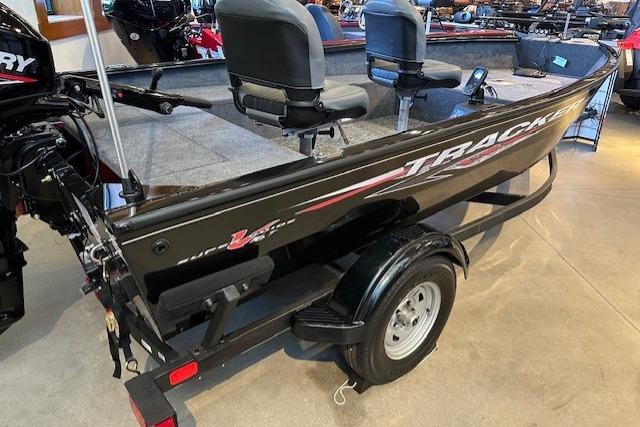 Tracker Super Guide V-16 T 2025 Tracker Super Guide V-16 T boat on trailer, featuring dual seats and sleek design.