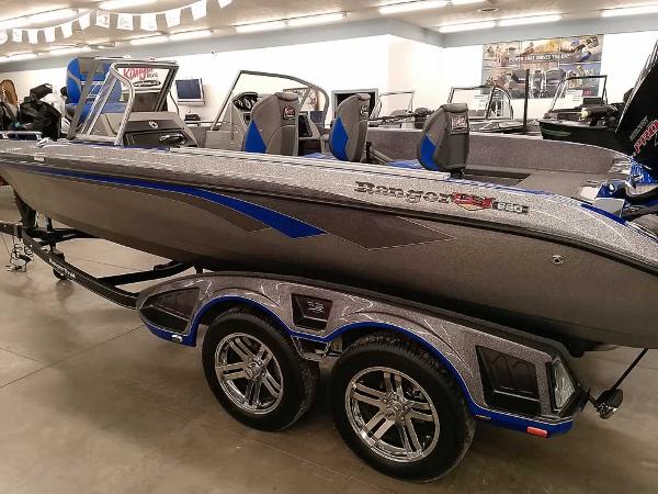 Ranger 620FS Fisherman 2025 Ranger 620FS Fisherman boat on display in showroom, featuring sleek design and dual-axle trailer.