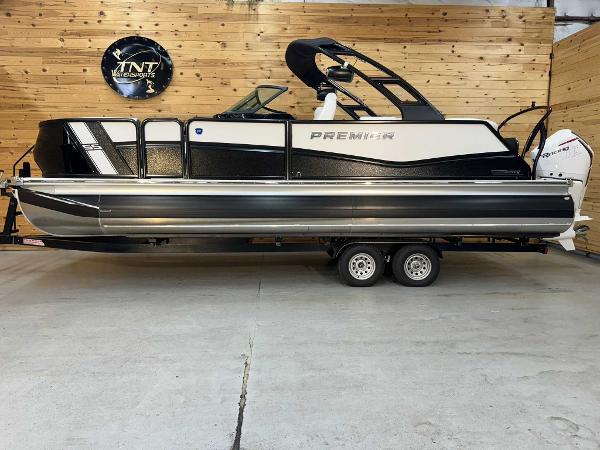 Premier 250 Super Sport 2024 Premier 250 Super Sport pontoon boat on trailer in showroom.