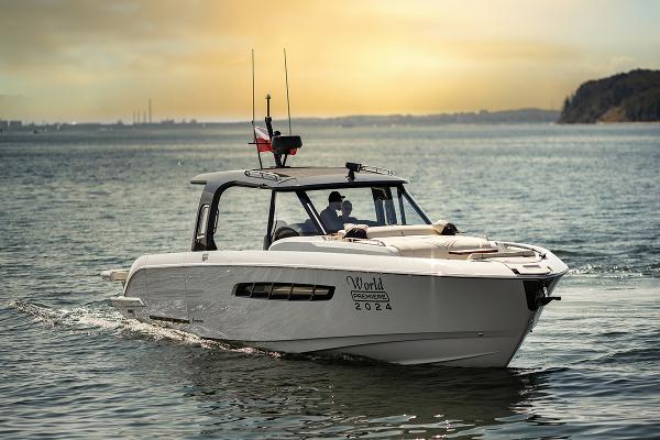 Wiszniewski Yachts W43 Wiszniewski Yachts W43, 2025 model, cruising on serene waters at sunset.