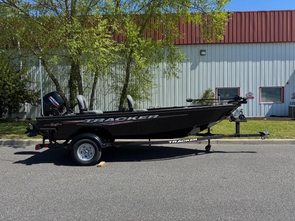 Tracker Super Guide V-16 T 2025 Tracker Super Guide V-16 T boat on trailer, parked outdoors.
