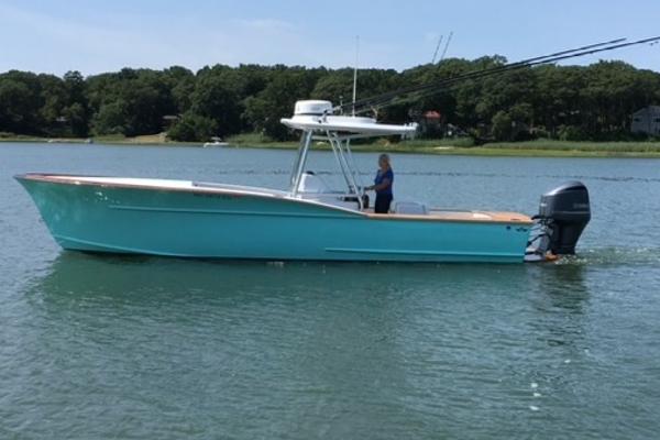 Custom Carolina 28 CC Harrison Boatworks 2017 Custom Carolina 28 CC Harrison Boatworks on calm water, side view.