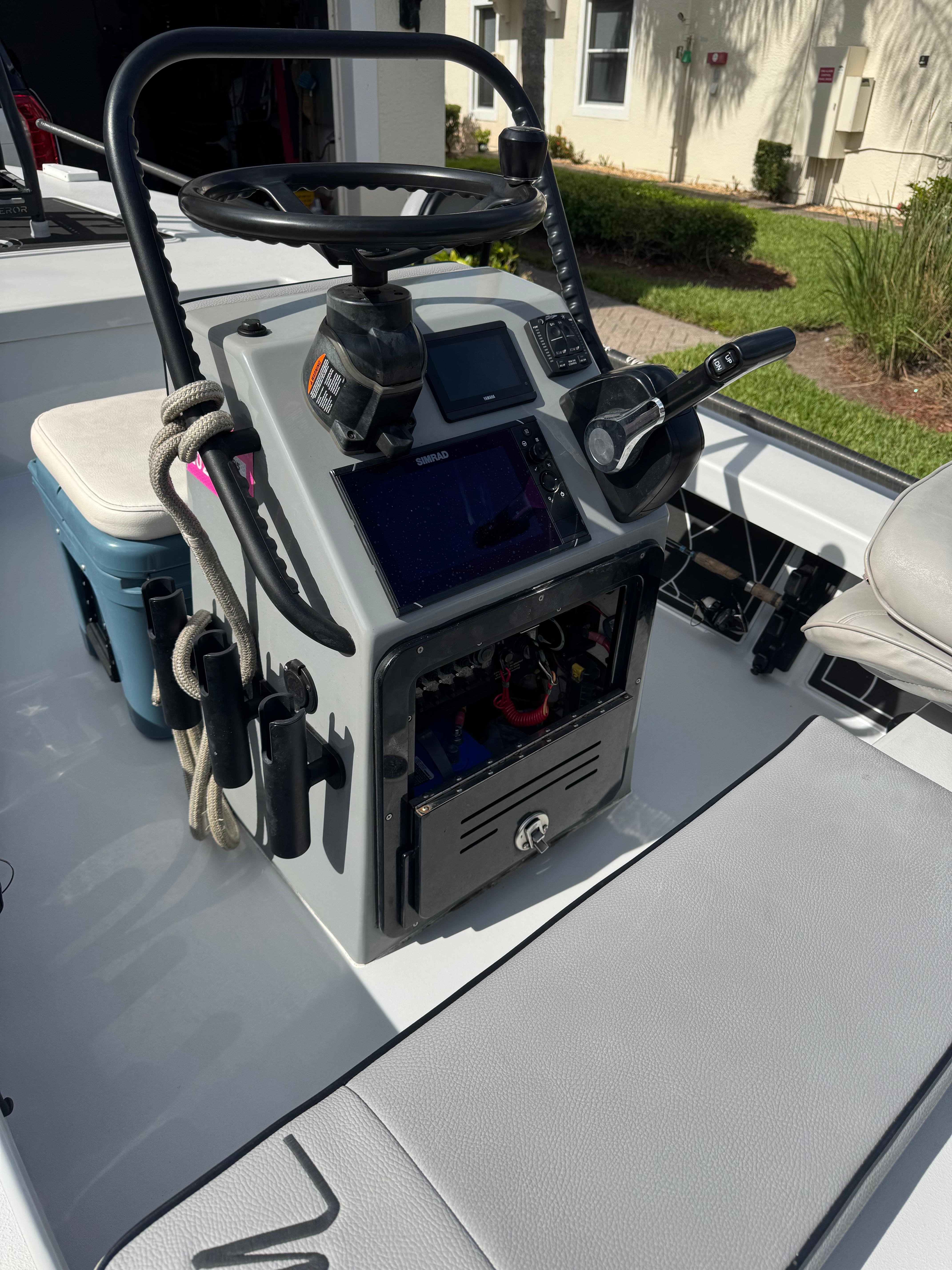 Maverick 17 HPX-V 2023 Maverick 17 HPX-V boat console with steering wheel and navigation equipment.