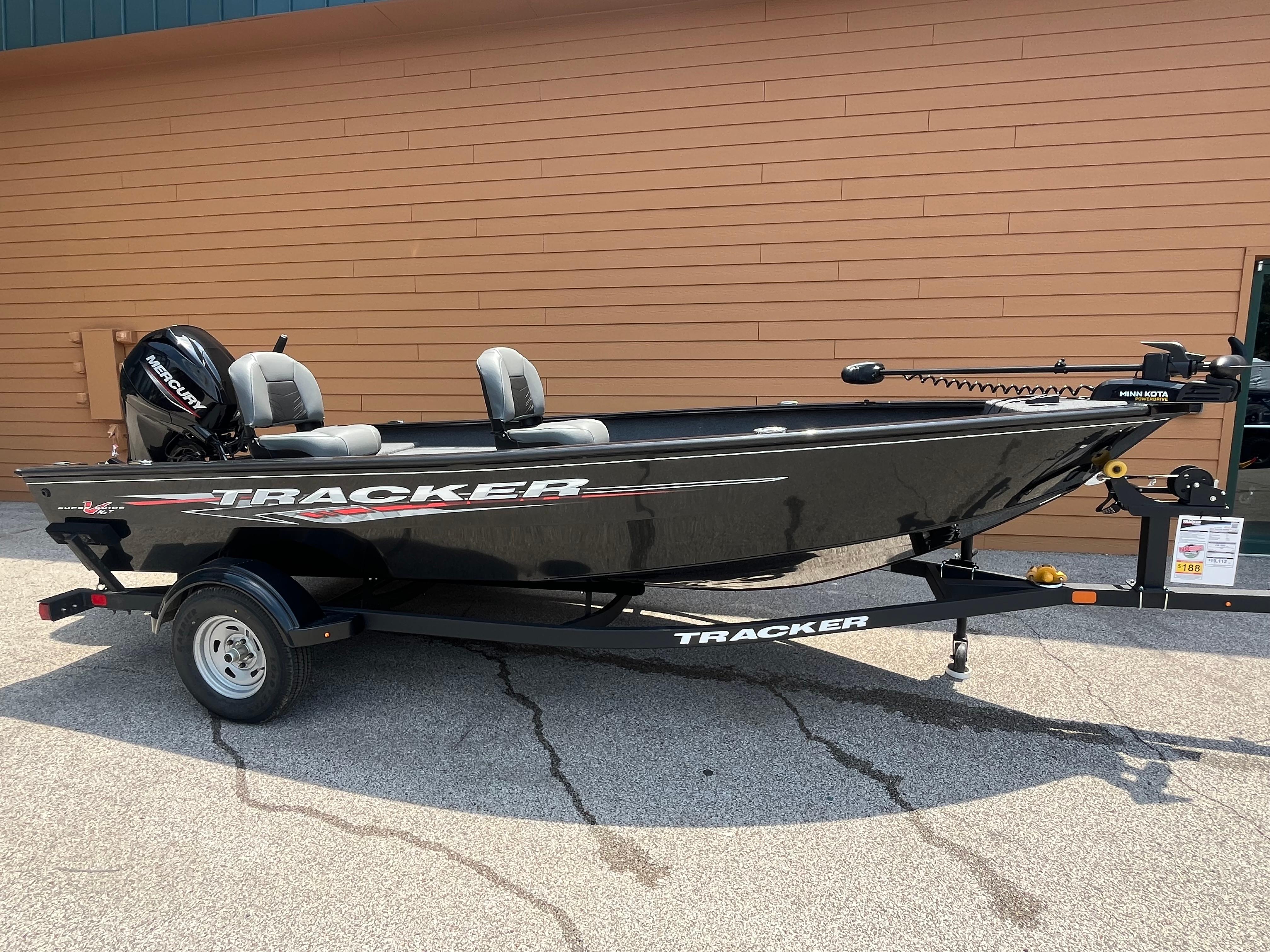 Tracker Super Guide V-16 T 2025 Tracker Super Guide V-16 T fishing boat on trailer, parked outdoors.