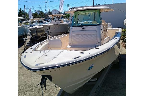 Grady-White Canyon 326 2025 Grady-White Canyon 326 boat displayed outdoors, showcasing sleek design and spacious deck.