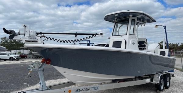 Tidewater 2500 Carolina Bay 2025 Tidewater 2500 Carolina Bay boat on trailer, parked outdoors under cloudy sky.