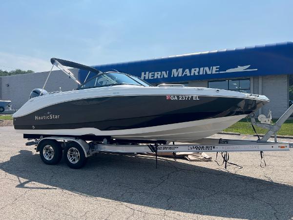 NauticStar 223 DC 2020 NauticStar 223 DC boat on trailer at Hern Marine dealership.