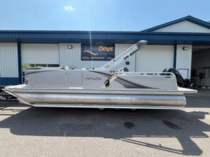 Avalon LSZ Versatile Rear Bench 2025 Avalon LSZ Versatile Rear Bench pontoon boat parked at Lake Days Marine.