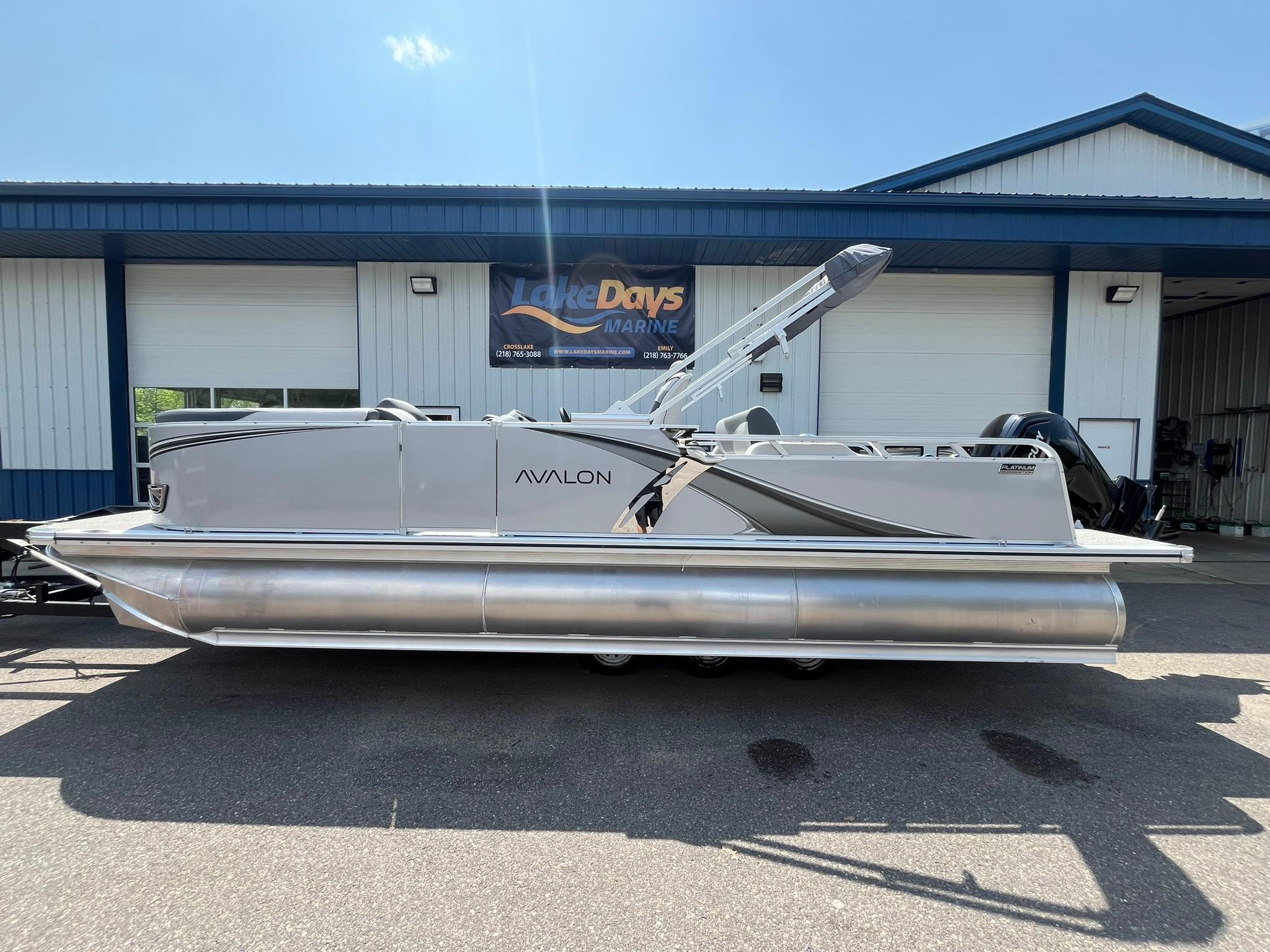 Avalon LSZ Versatile Rear Bench 2025 Avalon LSZ Versatile Rear Bench pontoon boat parked at Lake Days Marine.