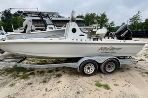 Key Largo 206 bay 2019 Key Largo 206 Bay boat on trailer, parked outdoors.