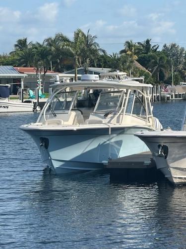Grady-White Freedom 335 2023 Grady-White Freedom 335 boat docked in a sunny marina.