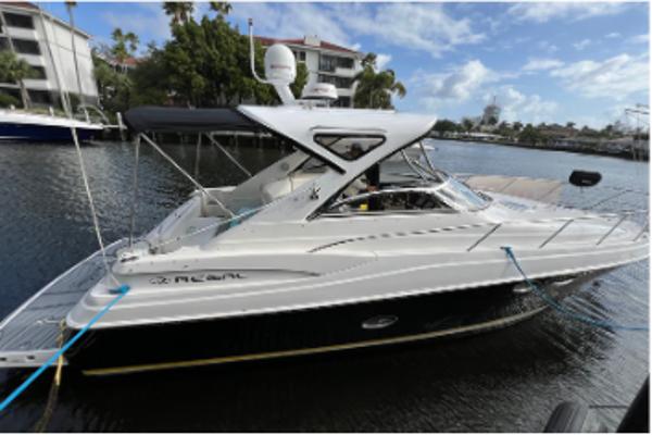 Regal Commodore 3760 IB 2007 Regal Commodore 3760 IB yacht docked in a serene marina setting.