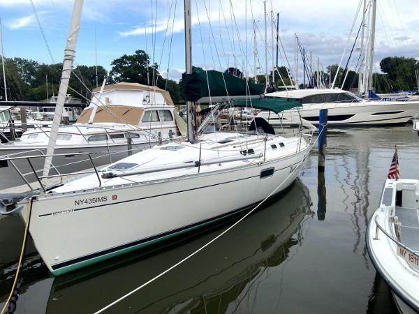 Beneteau Oceanis 351 1997 Beneteau Oceanis 351 sailboat docked in a marina, surrounded by other boats.
