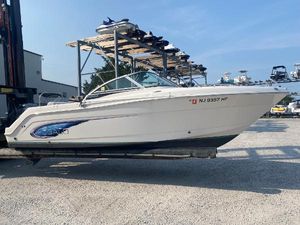 Robalo R227 Dual Console 2014 Robalo R227 Dual Console boat on display in a marina setting.