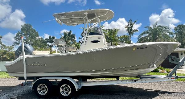 NauticStar 22 XS 2018 NauticStar 22 XS boat on trailer, side view, outdoors.