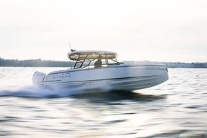 Saxdor 270 GTO - 25% Share NEW Saxdor 270 GTO boat speeding on water, 2026 model, side view.