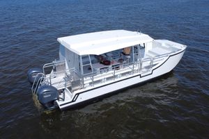 Custom BYD34 2026 Custom Passenger Catamaran BYD34 on water, featuring dual Yamaha engines.