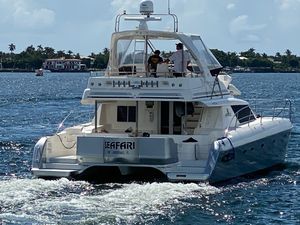 Africat Marine 420 Power Catamaran Africat Marine 420 Power Catamaran cruising on a sunny day, 2013 model.