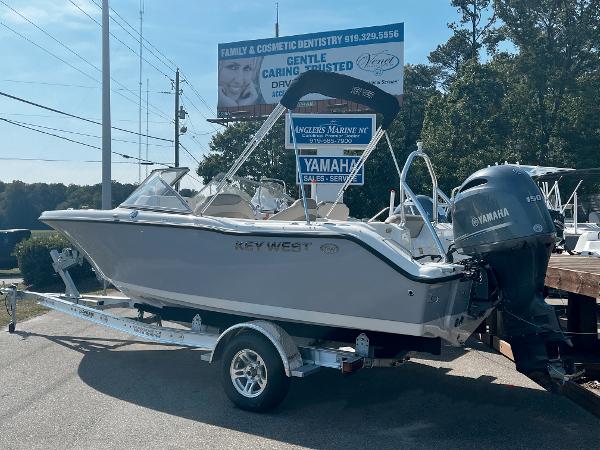 Key West 203 DFS 2024 Key West 203 DFS boat on trailer with Yamaha outboard motor.