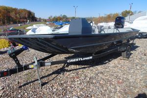 Crestliner 1870 Retriever FCC 2026 Crestliner 1870 Retriever FCC boat on trailer, displayed outdoors.