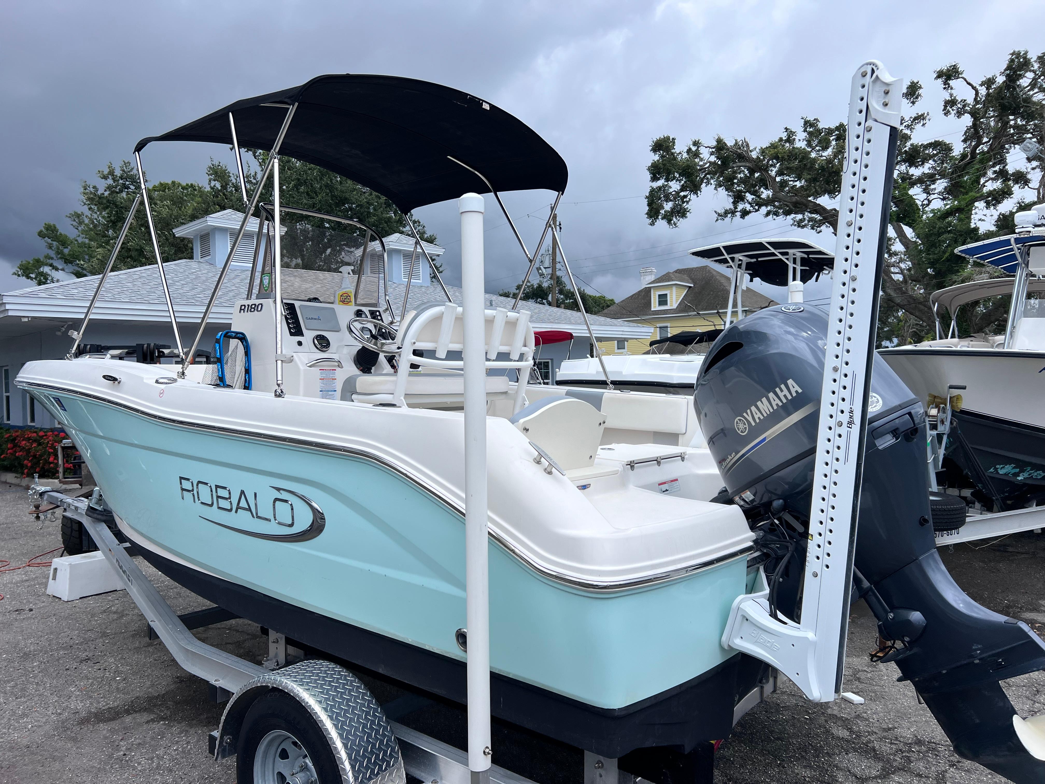 Robalo R180 Center Console 2020 Robalo R180 Center Console boat with Yamaha engine on trailer.