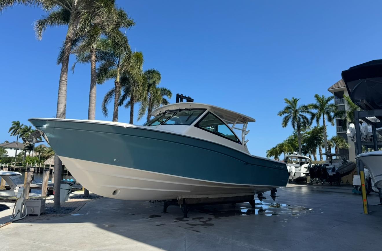 Grady-White Freedom 375 2019 Grady-White Freedom 375 boat on display with palm trees in the background.
