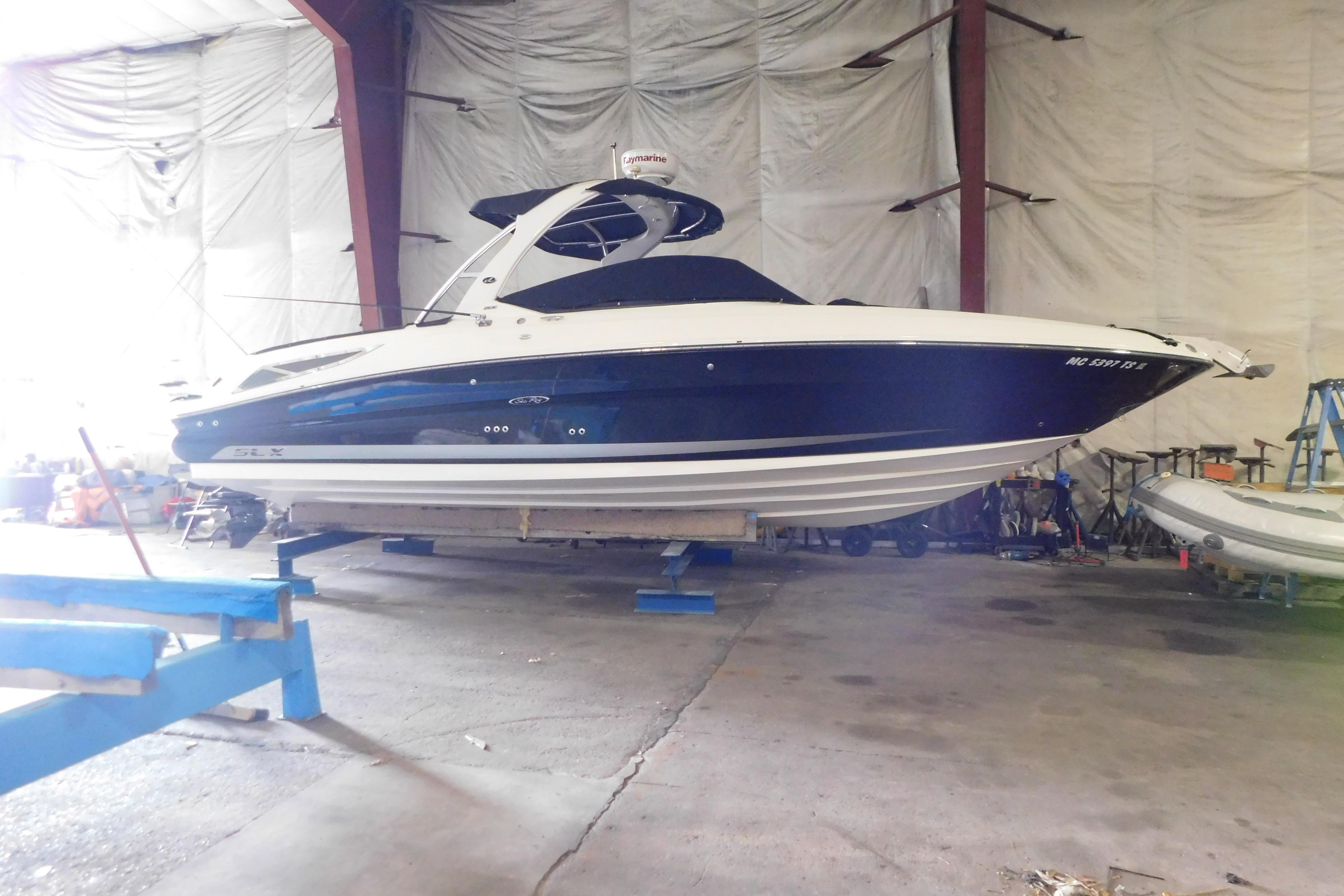 Sea Ray 300 SLX 2012 Sea Ray 300 SLX boat in indoor storage facility.