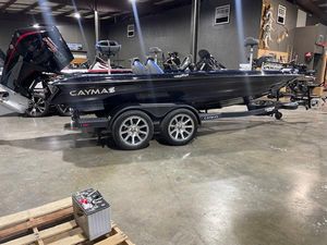 Caymas CX 20 2025 Caymas CX 20 boat on trailer in showroom, side view.