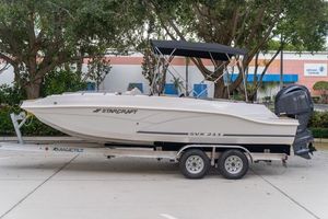 Starcraft SVX 211 OB 2026 Starcraft SVX 211 OB boat on trailer, parked outdoors.