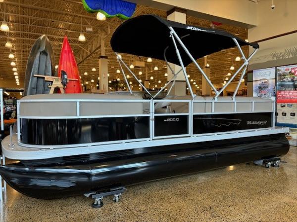 Ranger Reata 200C 2024 Ranger Reata 200C pontoon boat displayed indoors with canopy.
