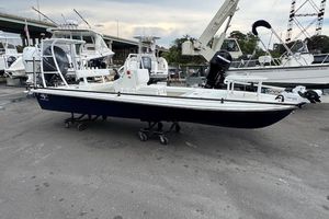 Beavertail Skiffs Vengeance 2024 Beavertail Skiffs Vengeance boat on display at a marina.