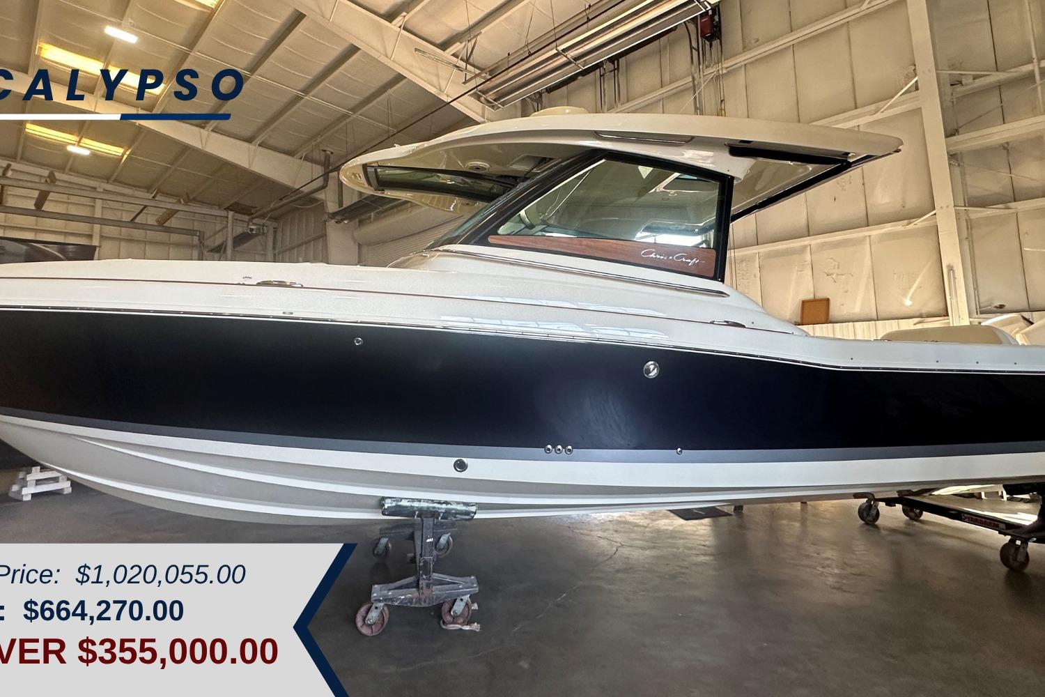 Chris-Craft Calypso 35 2024 Chris-Craft Calypso 35 boat in showroom, priced at $664,270, discounted by $355,000.