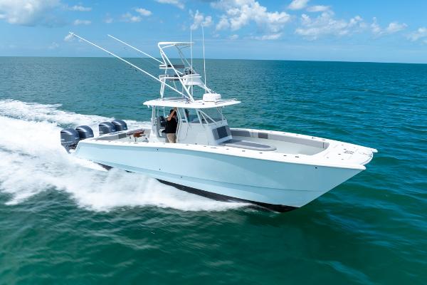 Freeman 37 VH Freeman 37 VH 2018 boat cruising on open sea under clear blue sky.