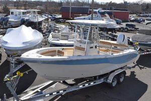 Sea Chaser 24 HFC 2023 Sea Chaser 24 HFC boat on a trailer in a marina.