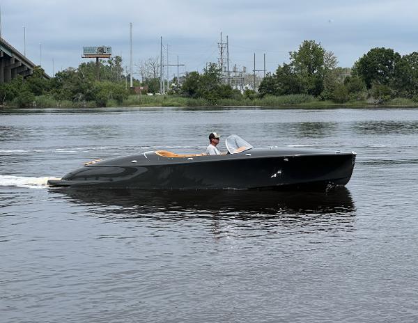 Seven Seas Yachts Hermes Speedster 2019 Seven Seas Yachts Hermes Speedster cruising on a calm river.