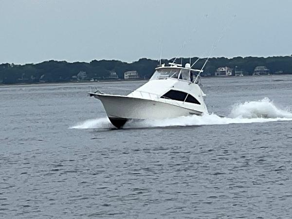 Ocean Yachts 56 Super Sport 2002 Ocean Yachts 56 Super Sport cruising on open water.