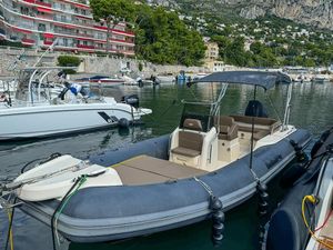BSC BSC 78 2019 BSC 78 boat docked in a marina, surrounded by other vessels and scenic hillside.