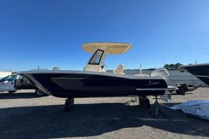 Scout 215 XSF 2026 Scout 215 XSF boat on display under clear blue sky.