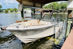 Grady-White Freedom 275 2014 Grady-White Freedom 275 boat docked on a serene waterfront.