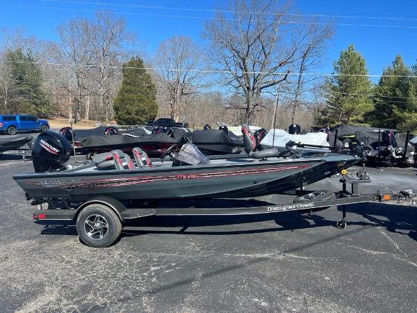Ranger RT178C 2023 Ranger RT178C fishing boat on a trailer in a parking lot.