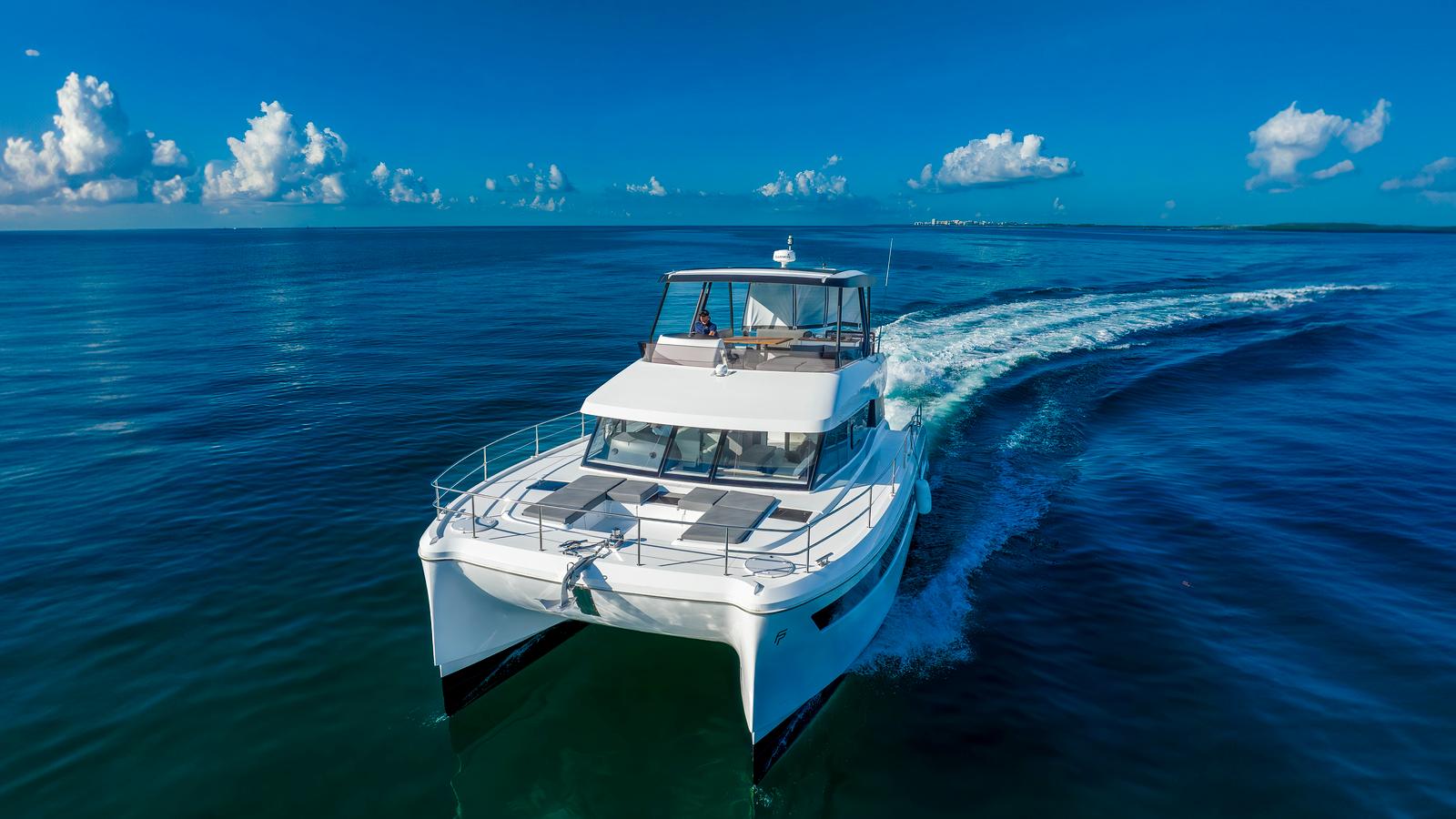 Fountaine Pajot MY 6 2023 Fountaine Pajot MY 6 yacht cruising on open blue sea.