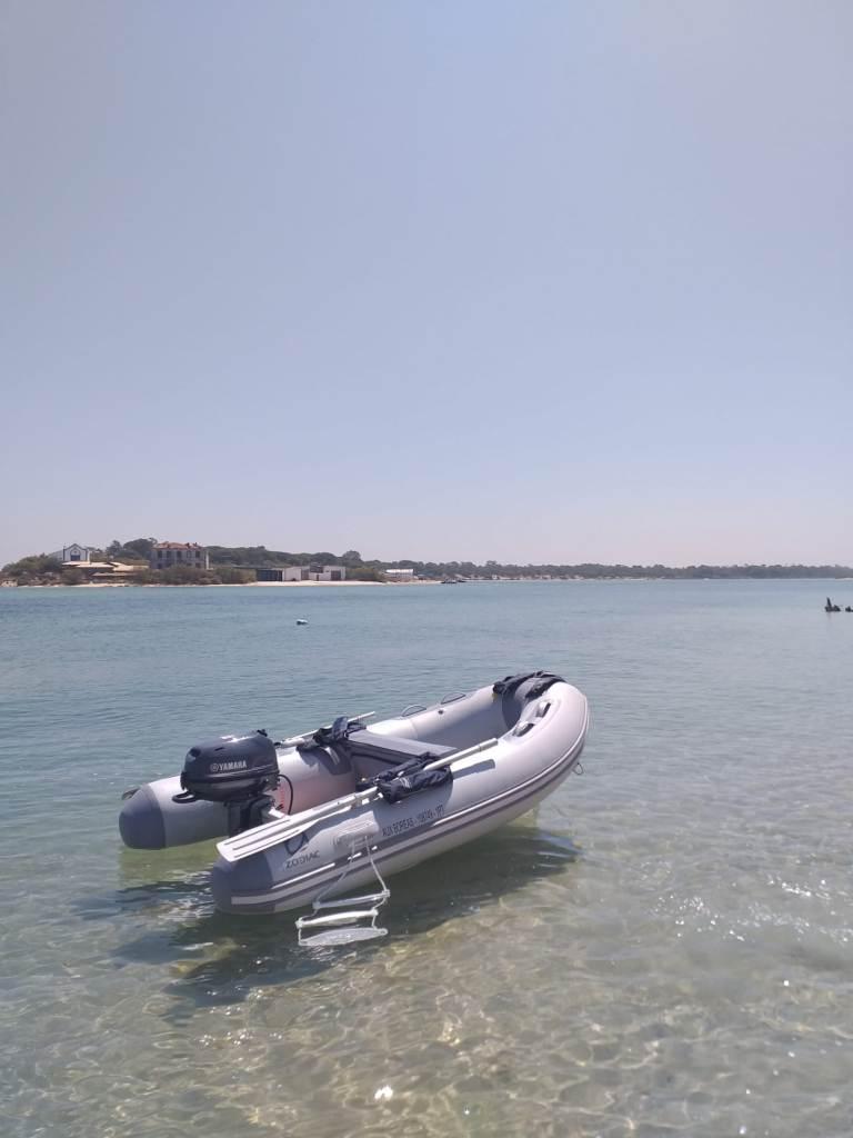 Zodiac Cadet RIB Alu 270 2023 Zodiac Cadet RIB Alu 270 boat floating in clear coastal waters.