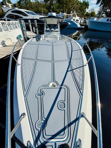 Fountain 38 TE 2003 Fountain 38 TE boat docked, showcasing spacious deck and sleek design.