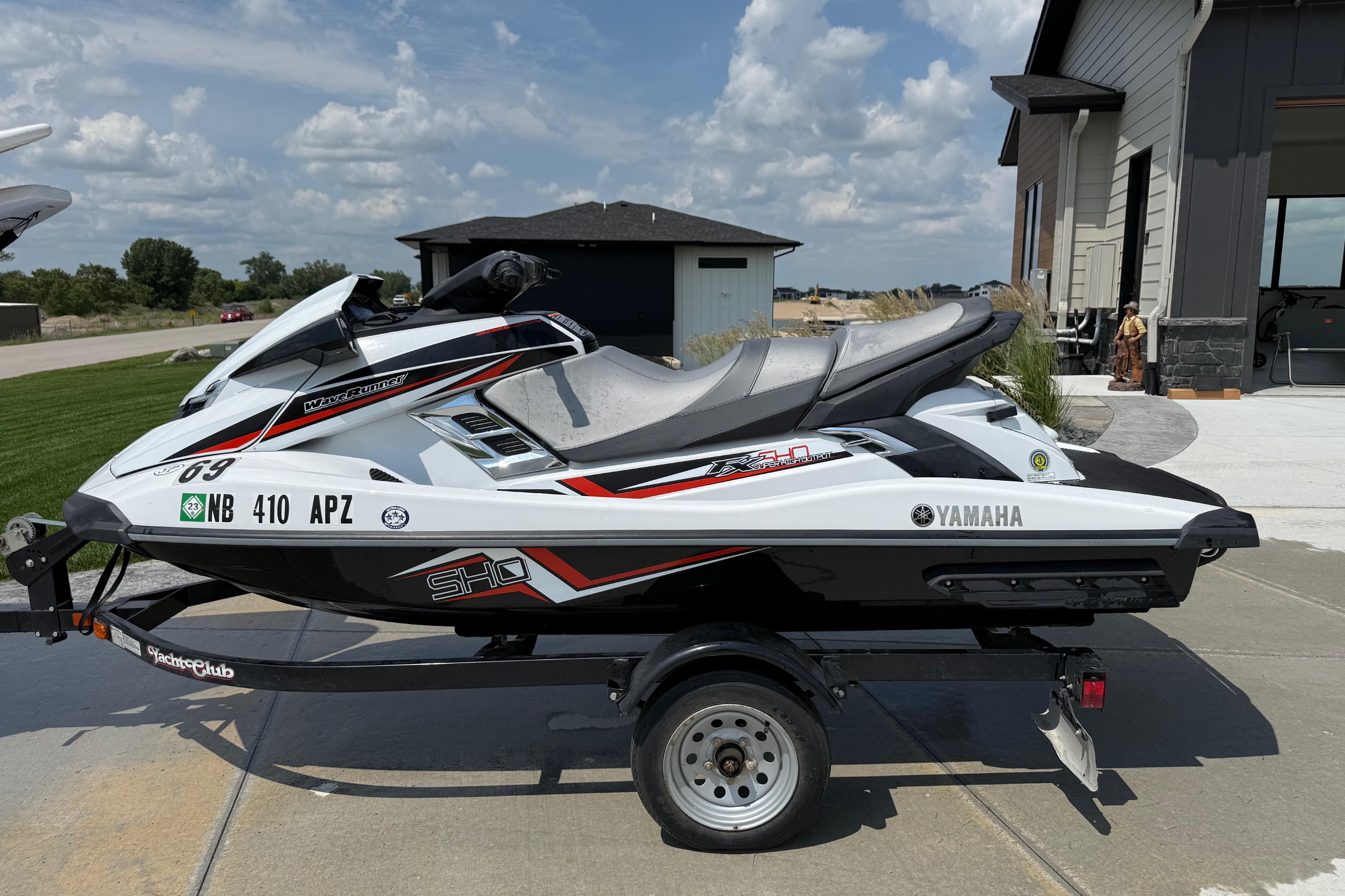 Yamaha WaveRunner FX SHO 2014 Yamaha WaveRunner FX SHO jet ski on trailer, parked outdoors.