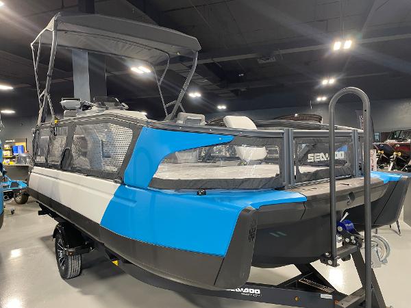 Sea-Doo Switch21 230 2023 Sea-Doo Switch pontoon boat in showroom, blue and white exterior.